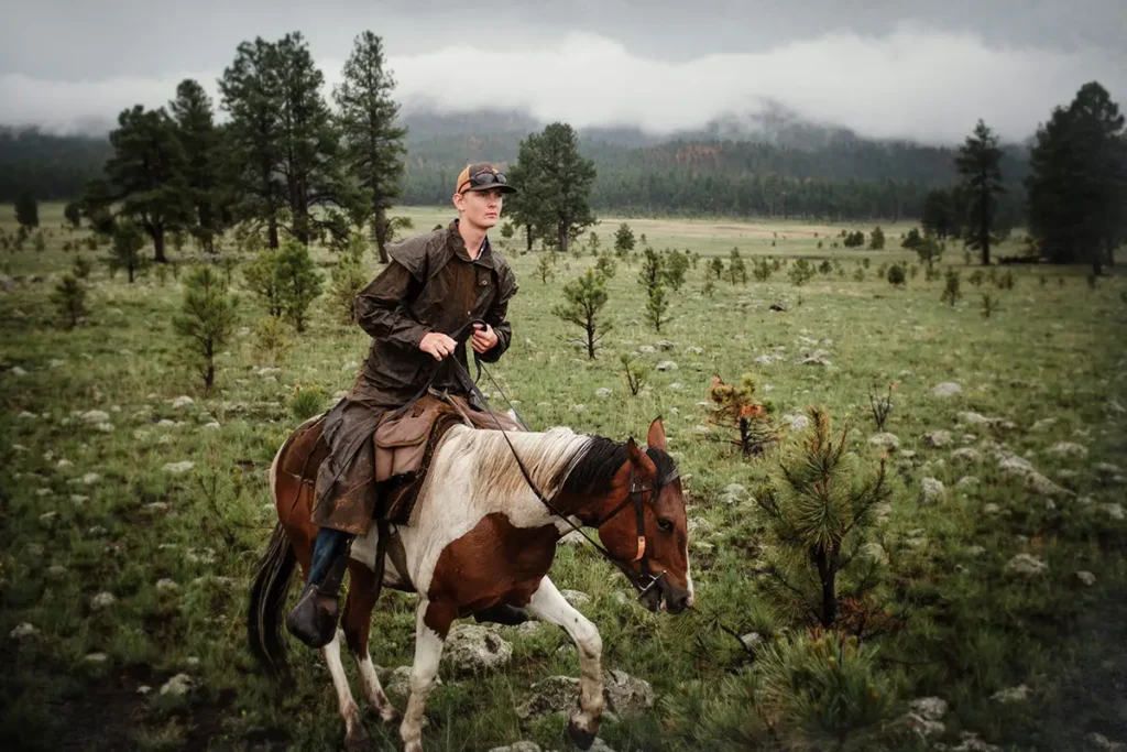 What is a dude ranch? A young rider grows in his experience and begins to answer exactly that question during his Dude Ranch vacations.